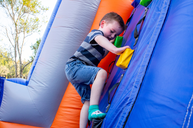 Inflatable Obstacle Course - child climbing